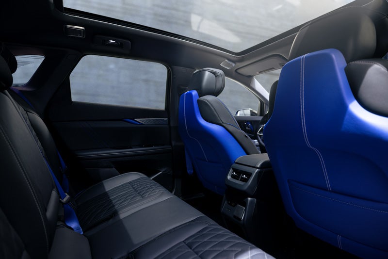 Back Seat View of the 2026 OPTIQ-V Blue Front Seats, Sun Roof, and Interior | Spearfish Cadillac in Spearfish SD